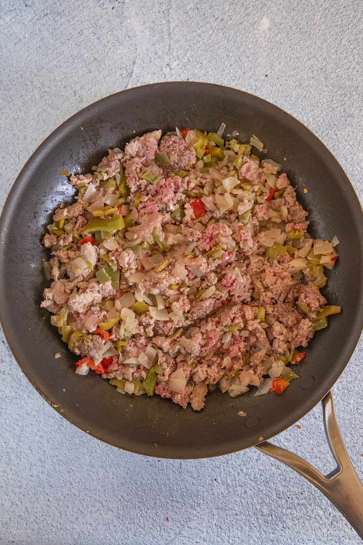 Browning the ingredients to make Crockpot Chili