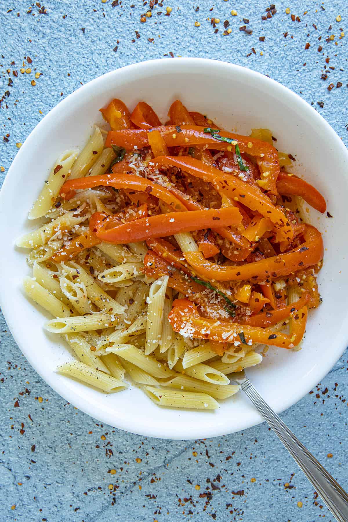 Peperonata in a bowl with pasta noodles