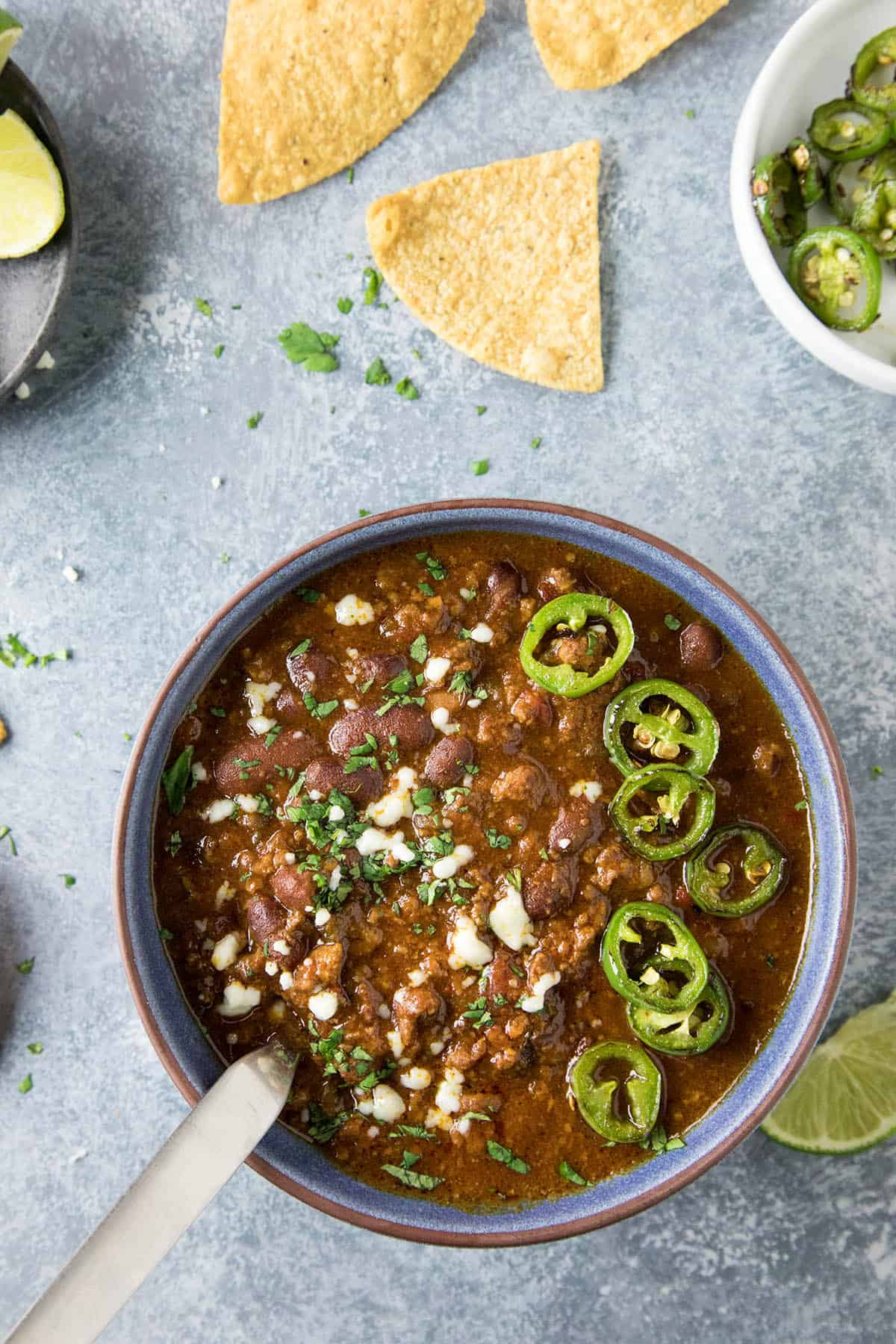 Southwest Style Slow Cooker Chili in a bowl with garnish
