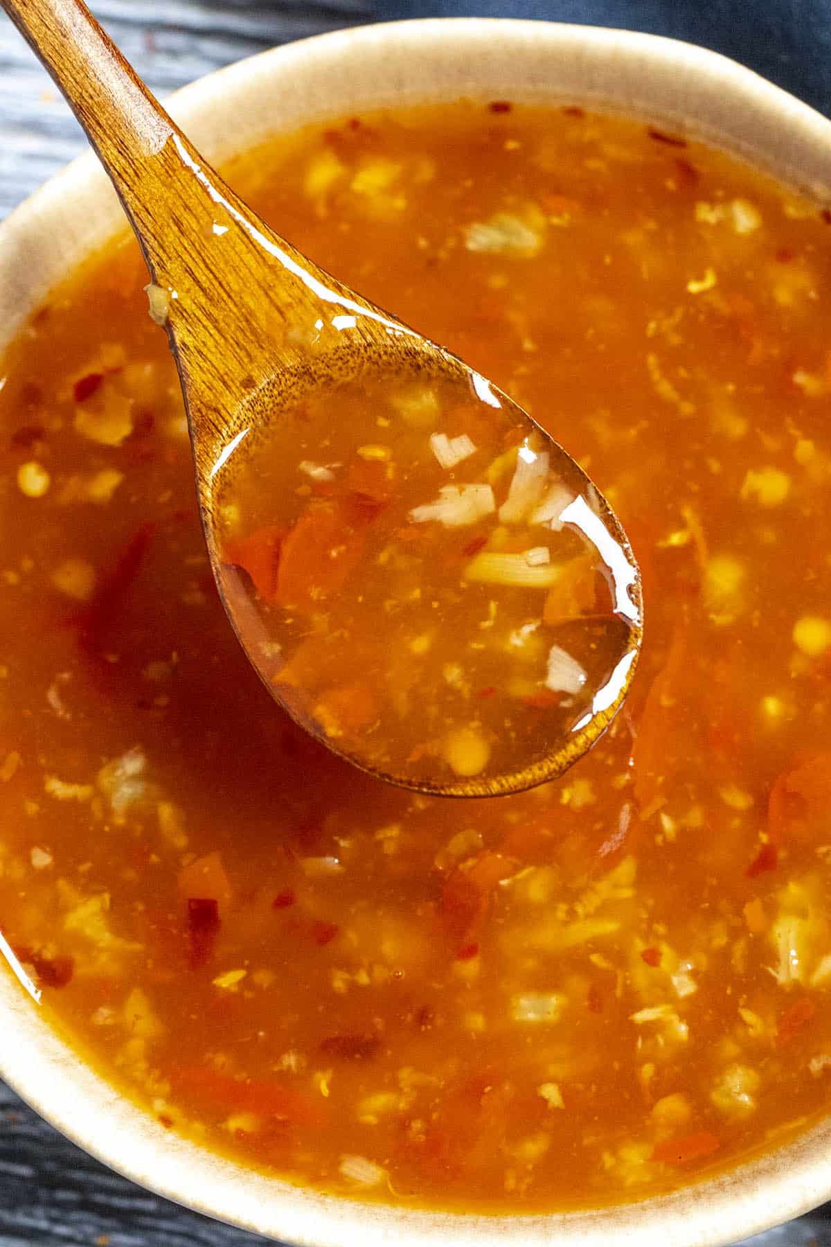 Sweet and spicy Thai Sweet Chili Sauce on a spoon