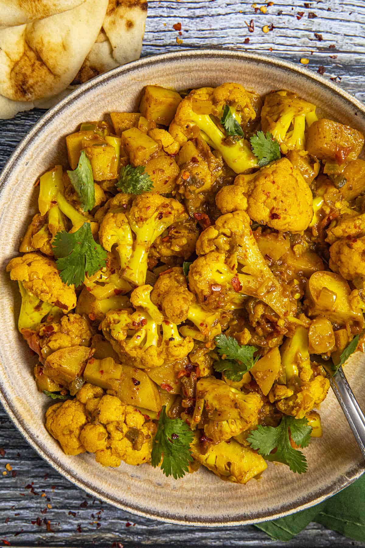 Aloo Gobi in a bowl with fresh cilantro