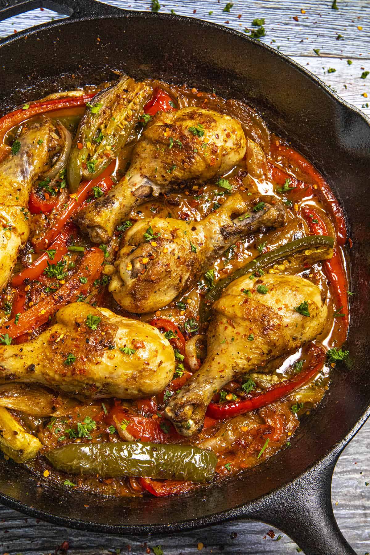 Italian Chicken Drumsticks in a pan with vegetables