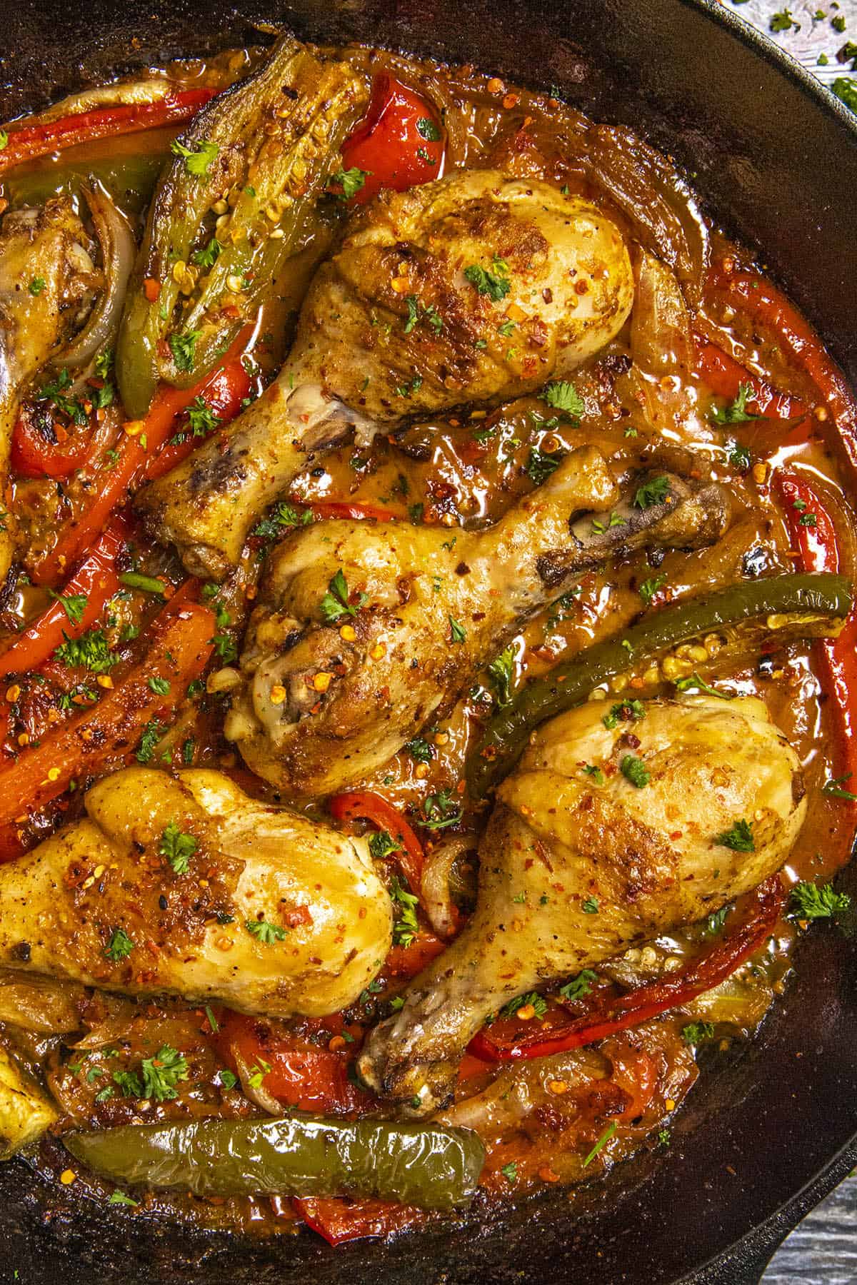 Chicken Drumsticks with Peppers and Paprika in a pan, ready to serve
