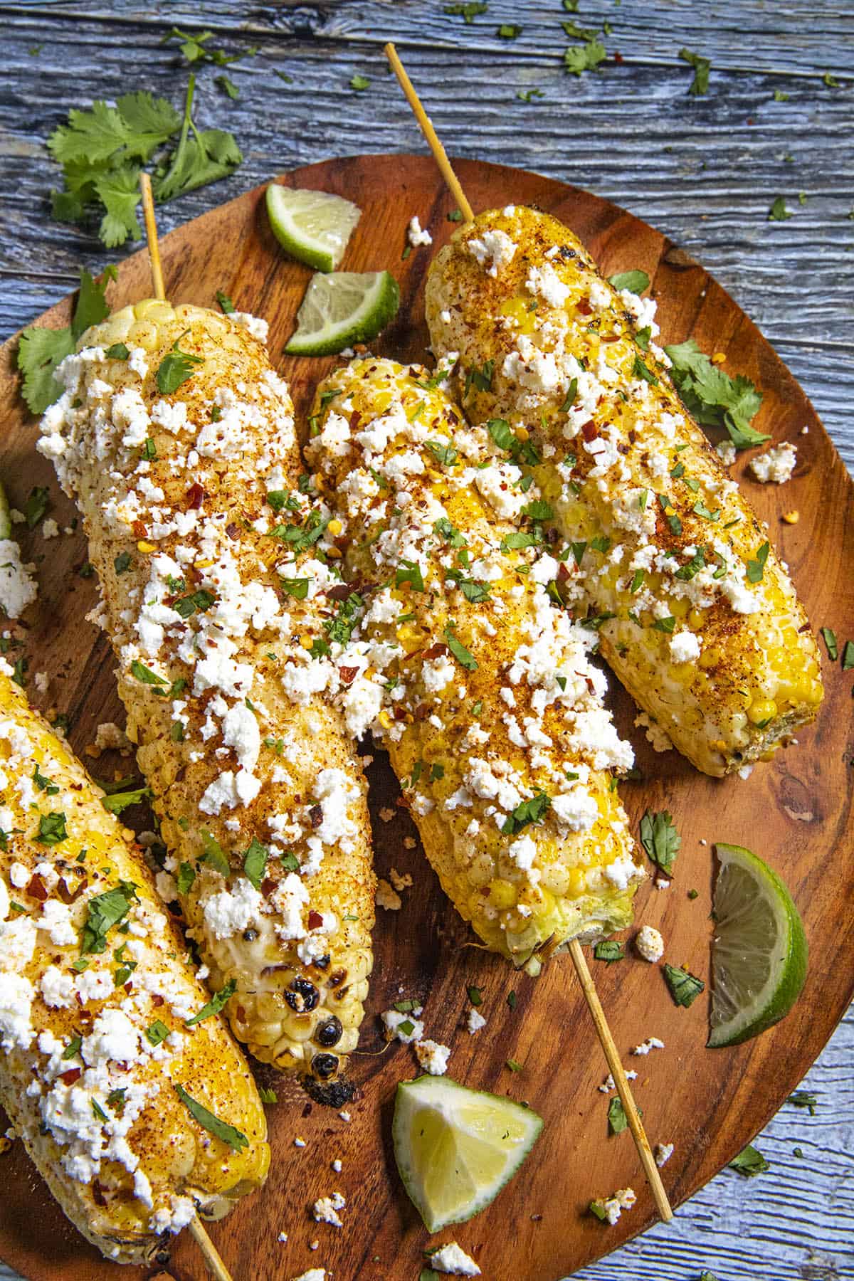Elotes on a platter, ready to serve