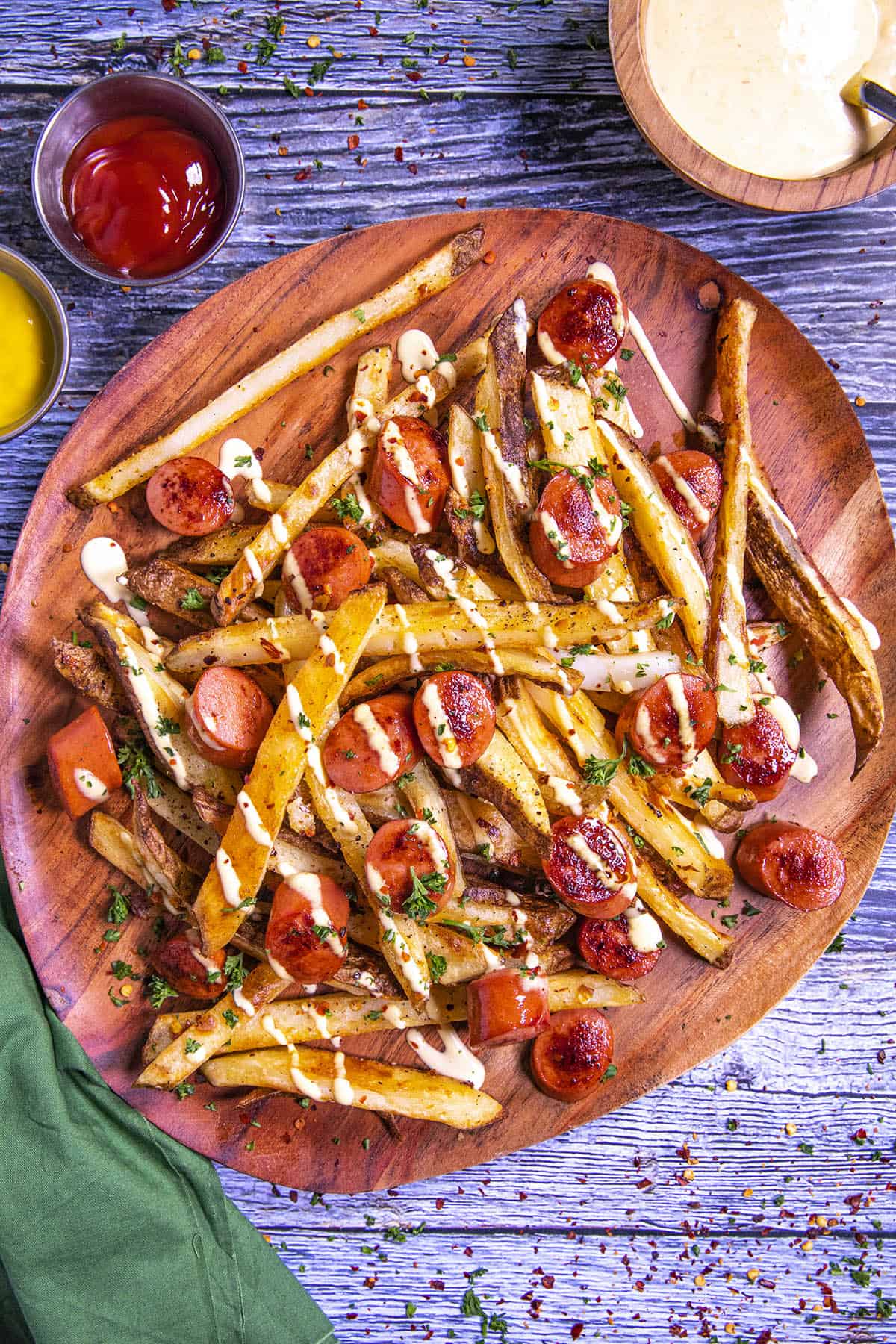 Salchipapas on a platter, ready to serve