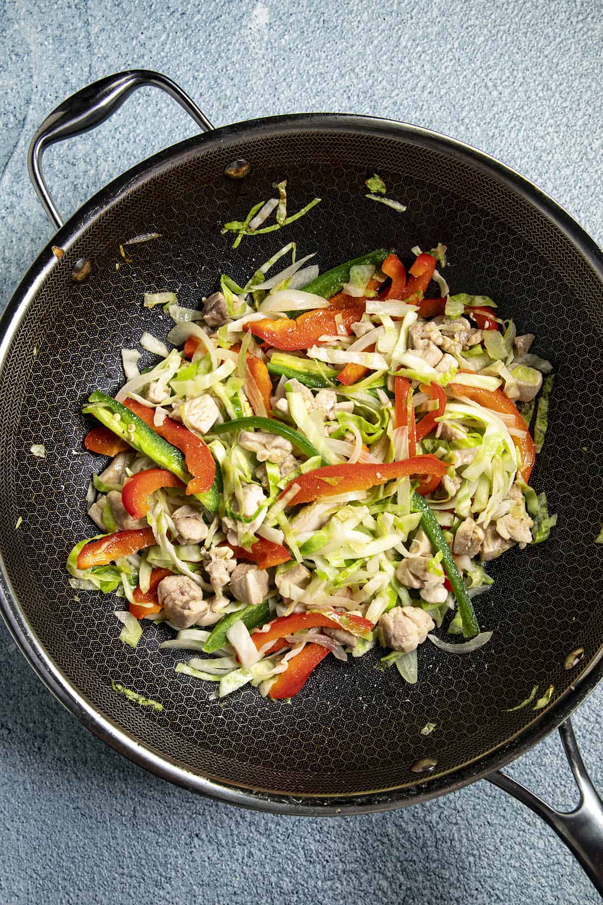 Stir frying the vegetables to make Chow Mein