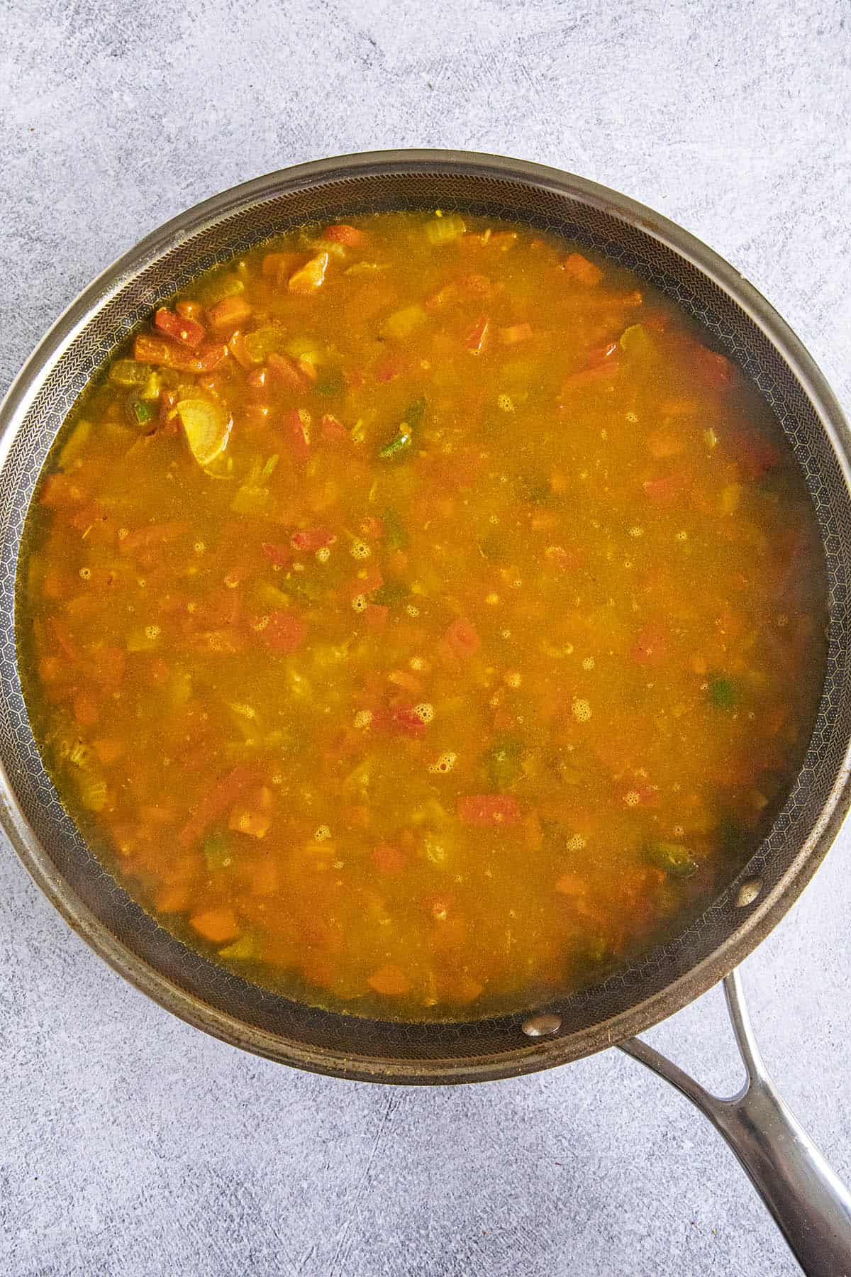Curried Rice simmering in a hot pan