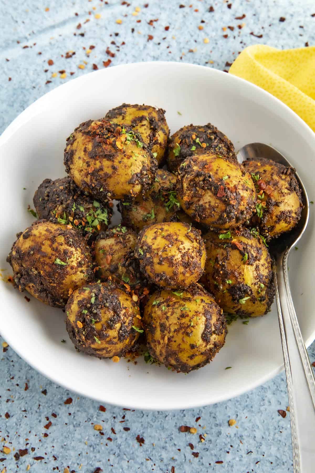 Indian spiced Bombay Potatoes in a serving bowl