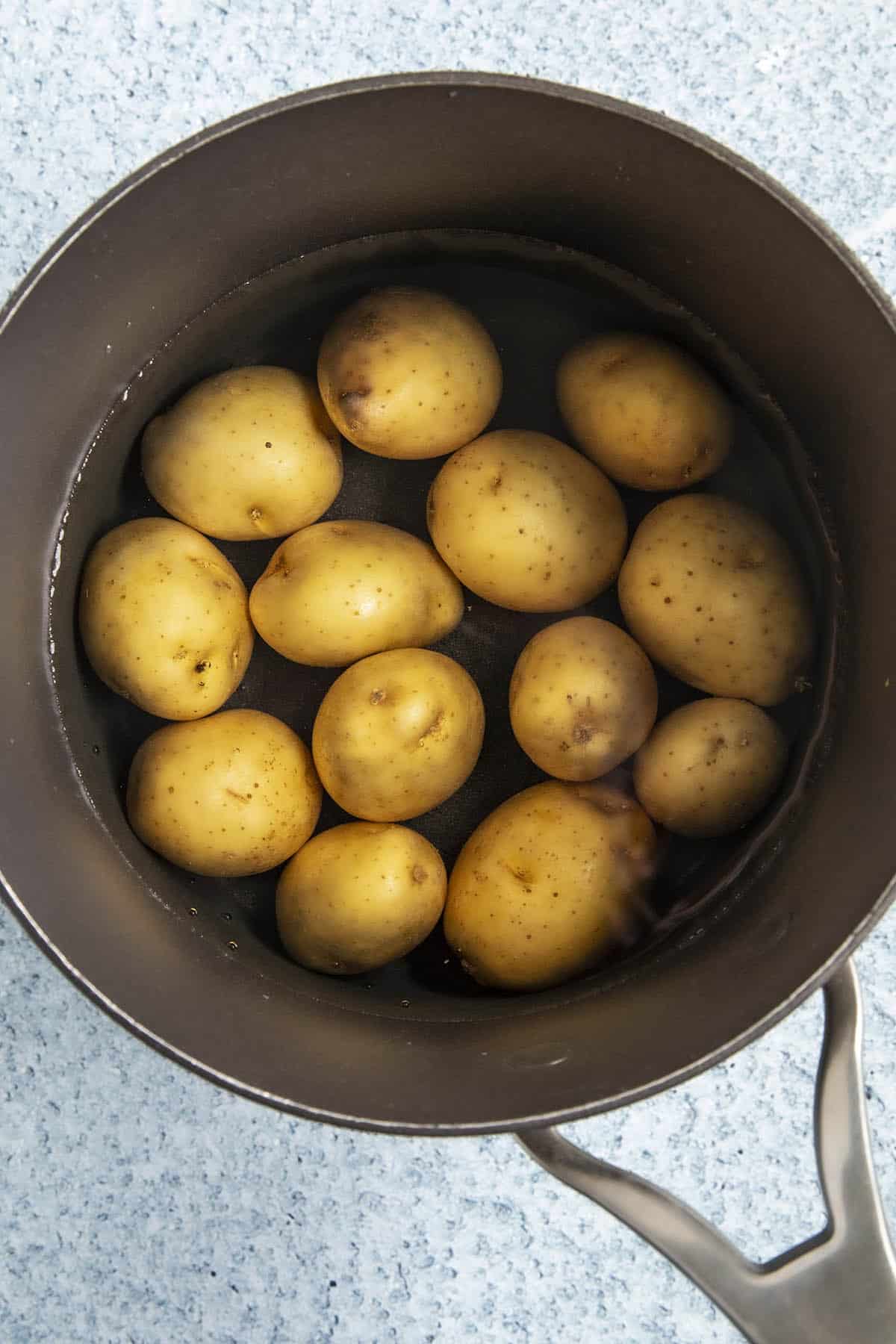 Boiling potatoes to make Bombay Potatoes