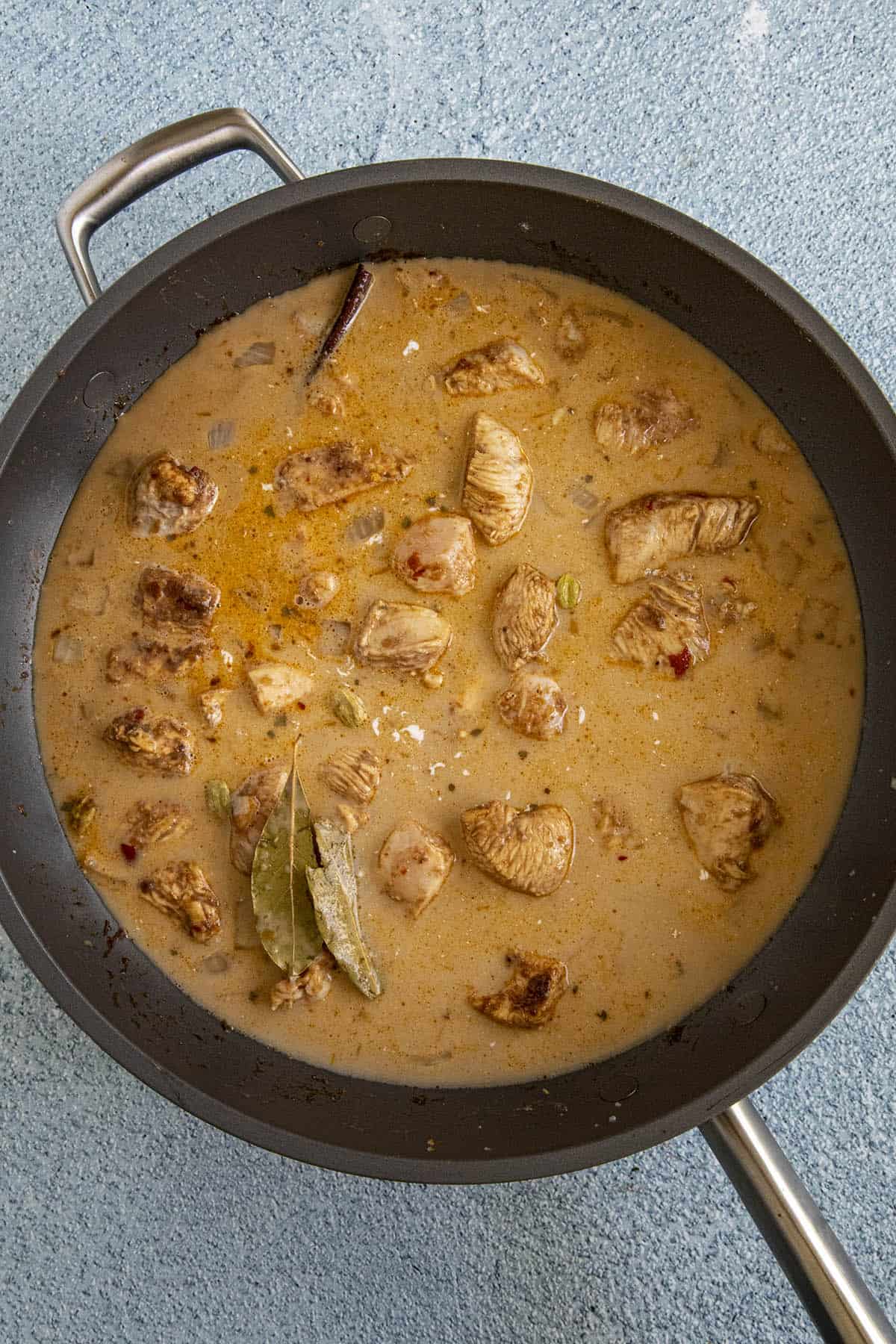 Coconut milk added to the Massaman Curry