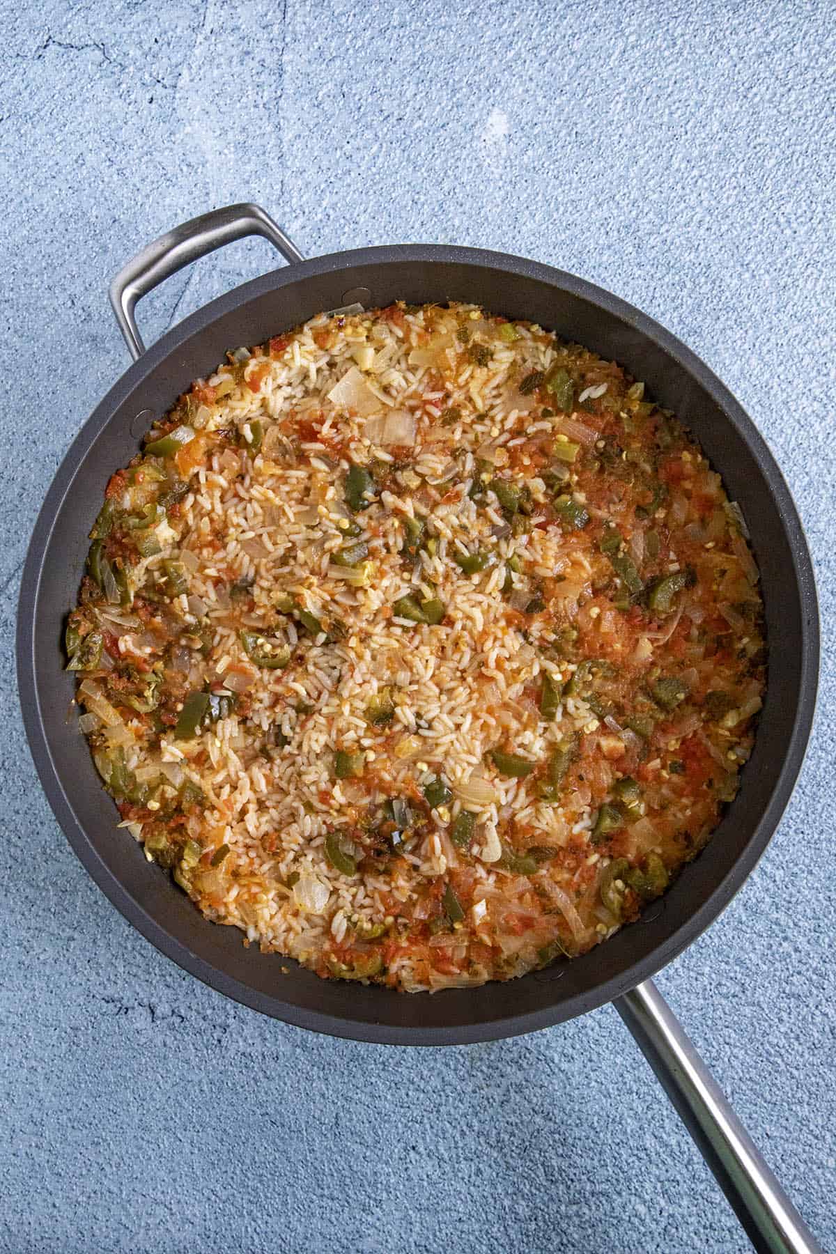 Mexican Rice just about done in a pan, before fluffing