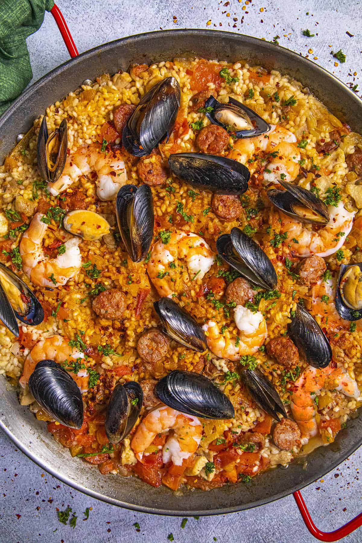 Paella in a pan with lots of seafood