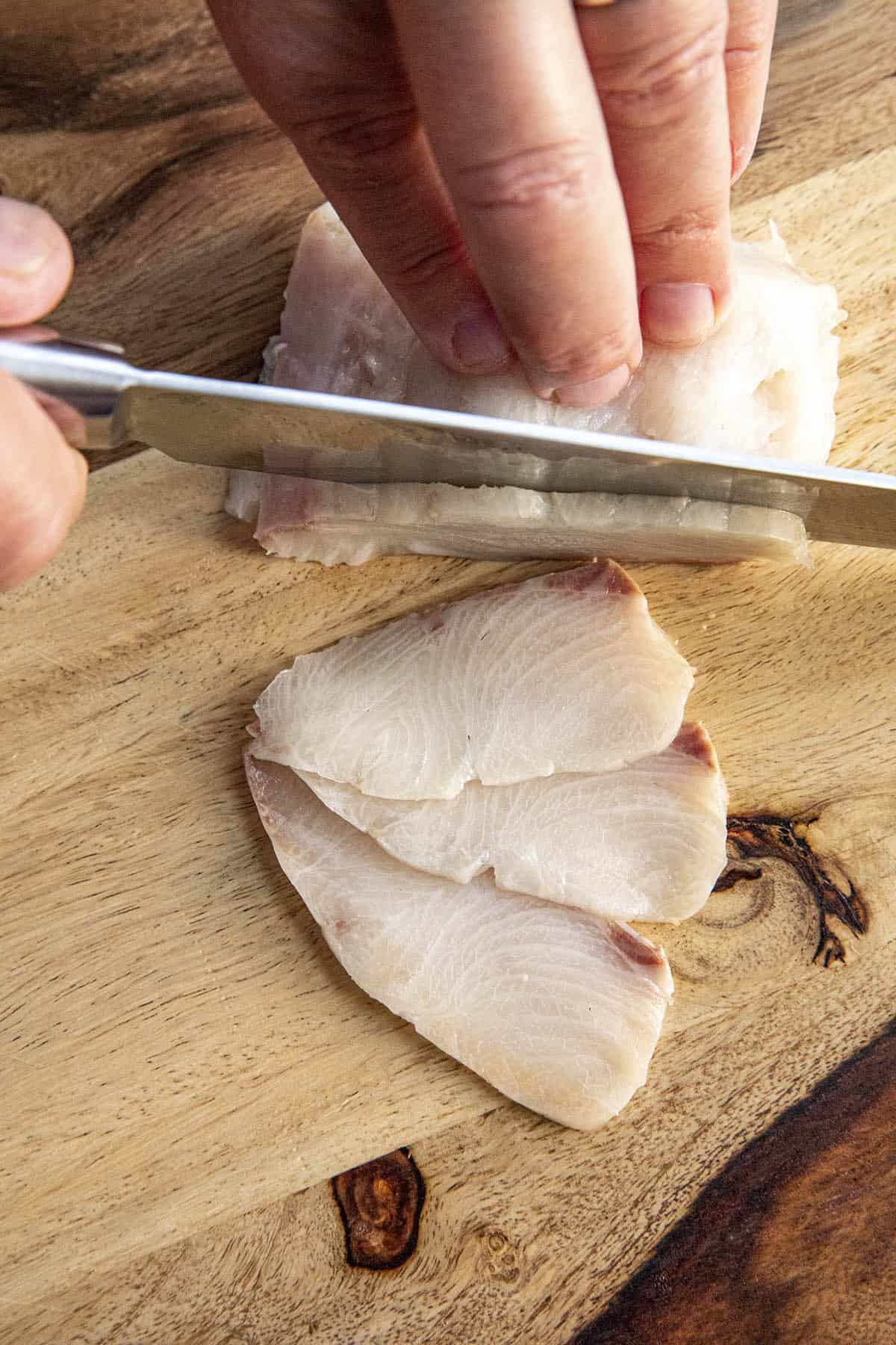 Mike thinly slicing yellowtail (hamachi) to make tiradito