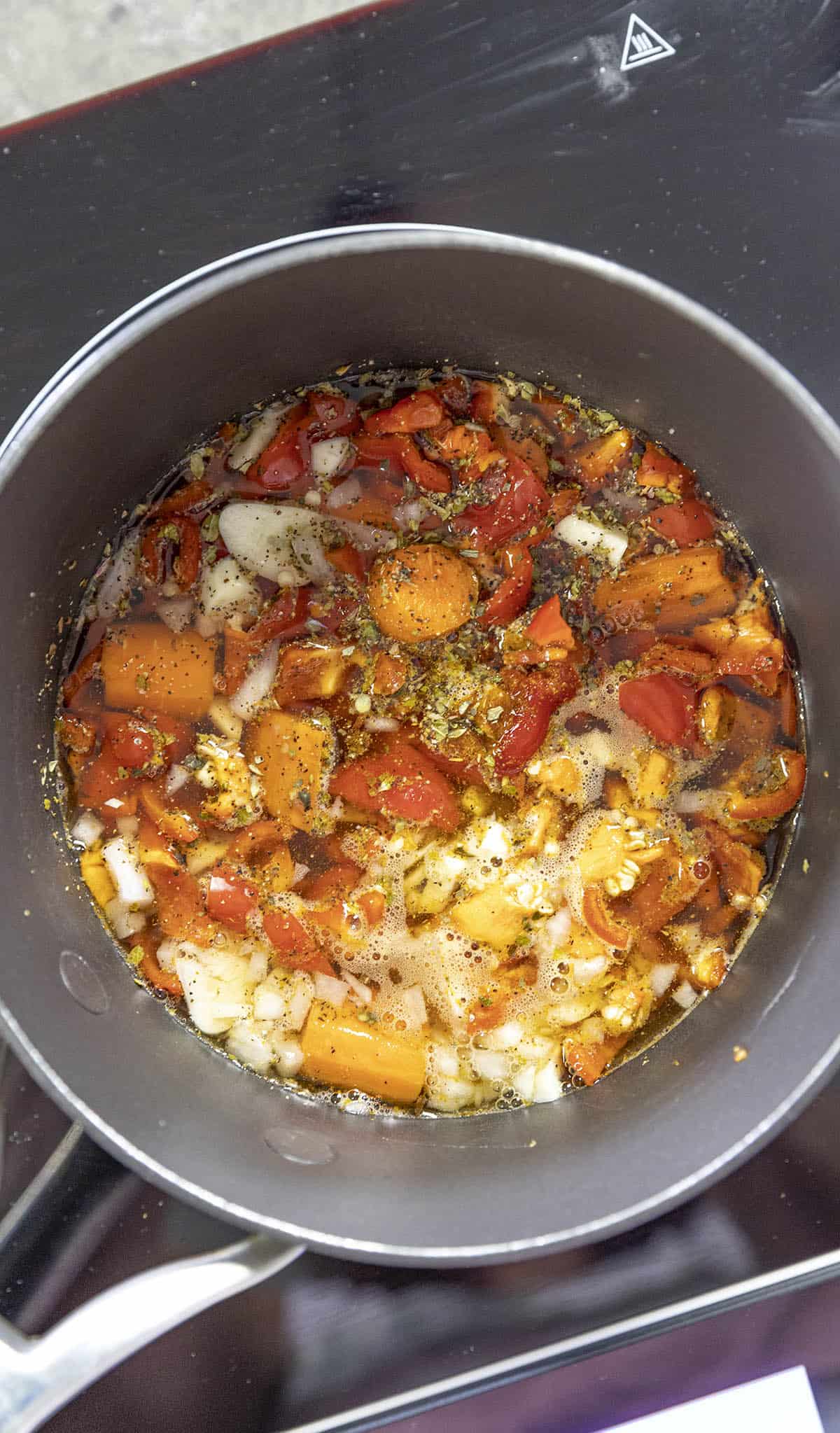 Habanero Hot Sauce ingredients simmering in a pot