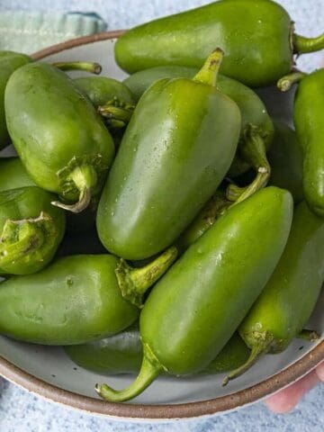 A large bowl of jalapeno peppers