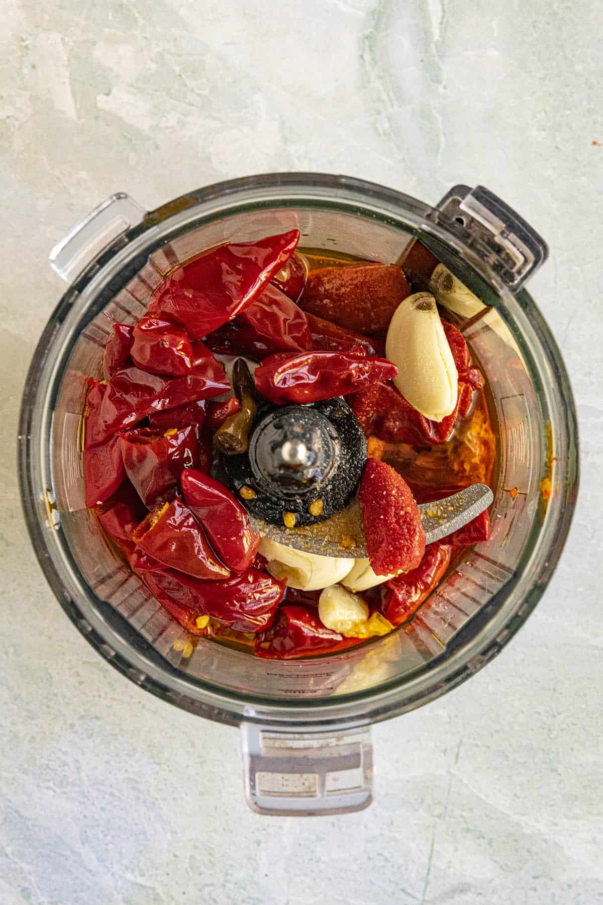 Calabrian Chili Paste ingredients in a food processor
