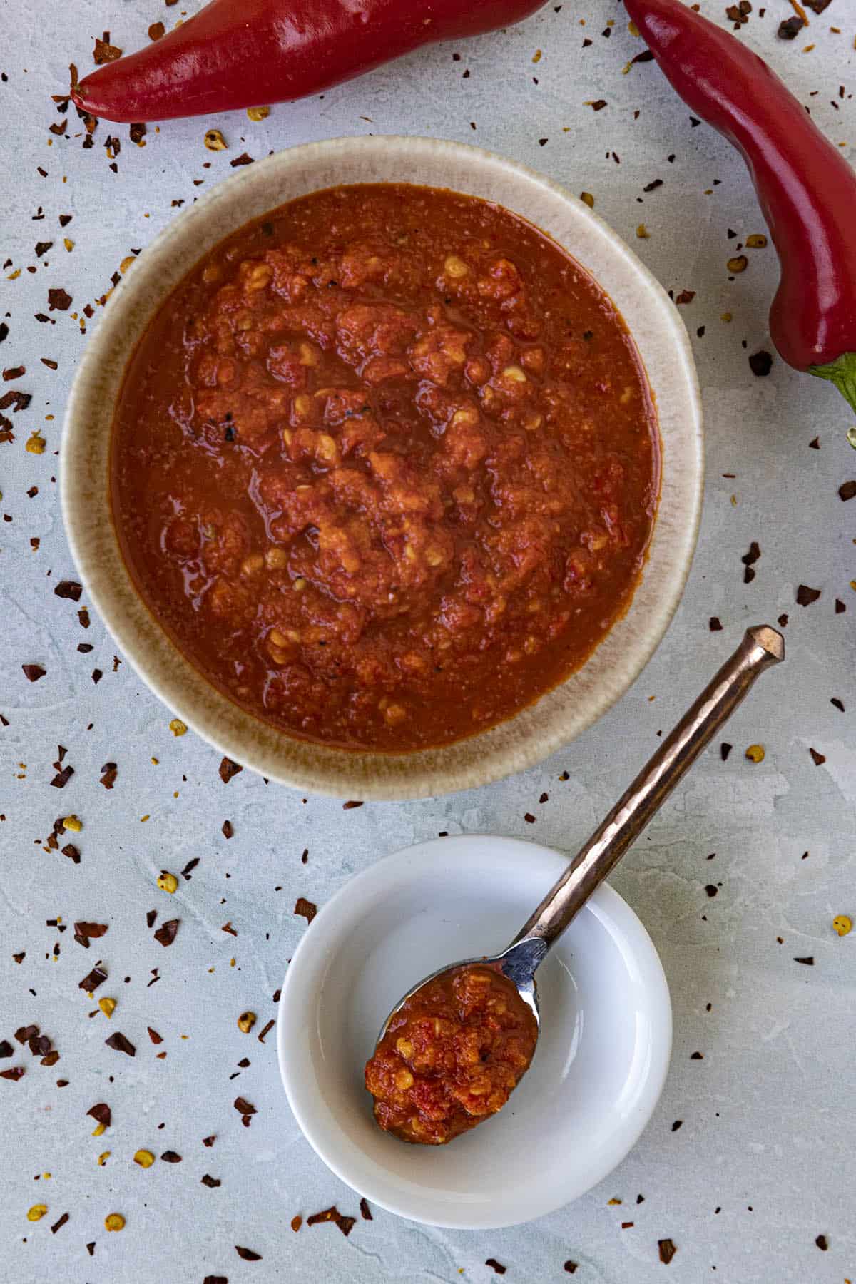 Homemade Chili Garlic Sauce in a bowl and on a spoon