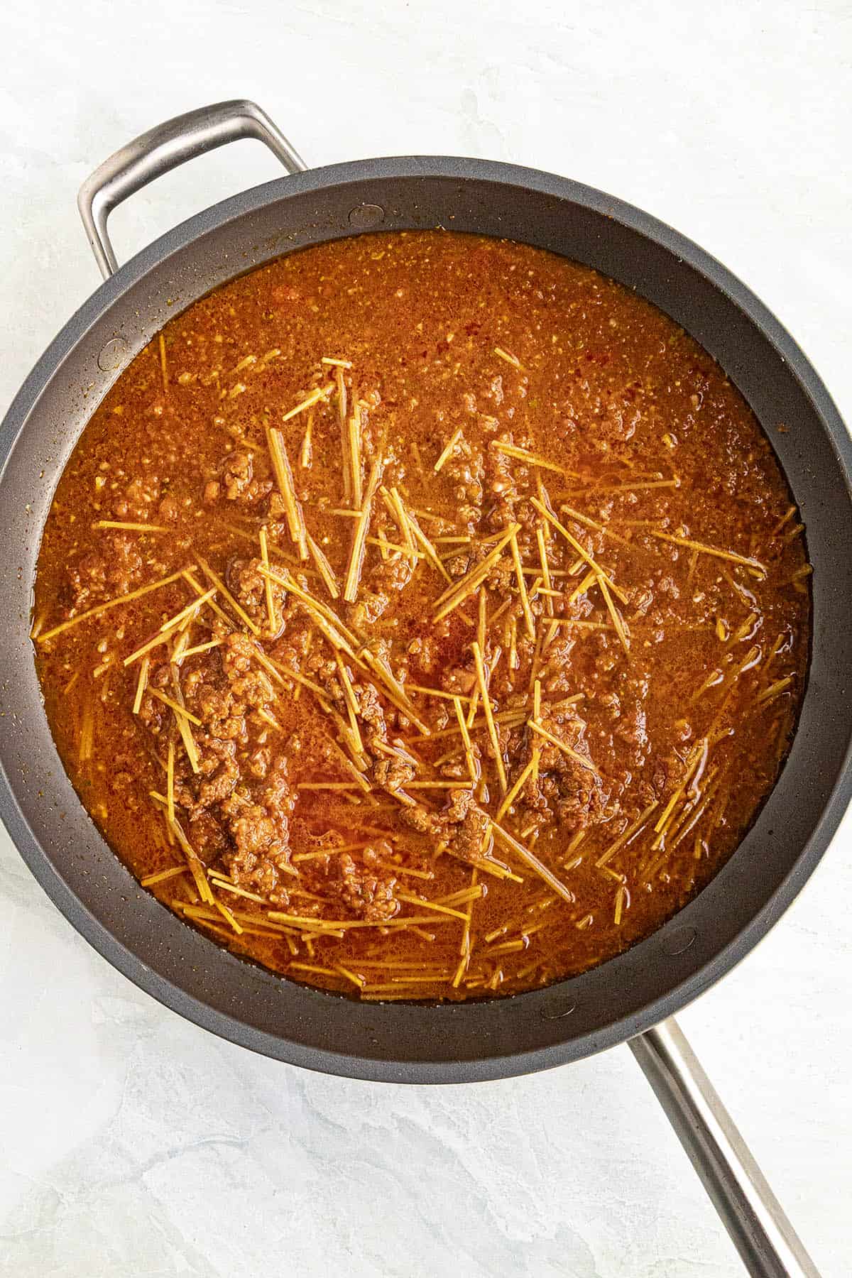 Simmering Sopa de Fideo in a pan