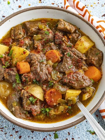 Hungarian Goulash in a bowl with a spoon