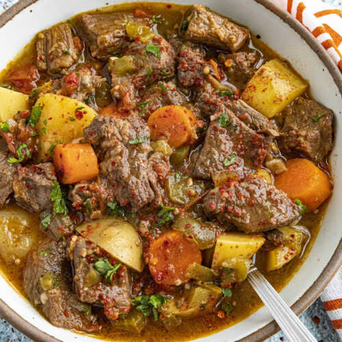 Hungarian Goulash in a bowl with a spoon