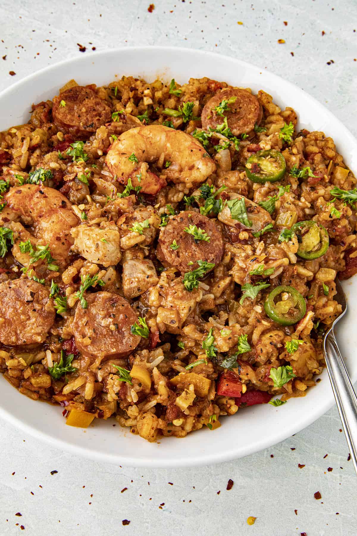 Delicious jambalaya in a bowl with a fork