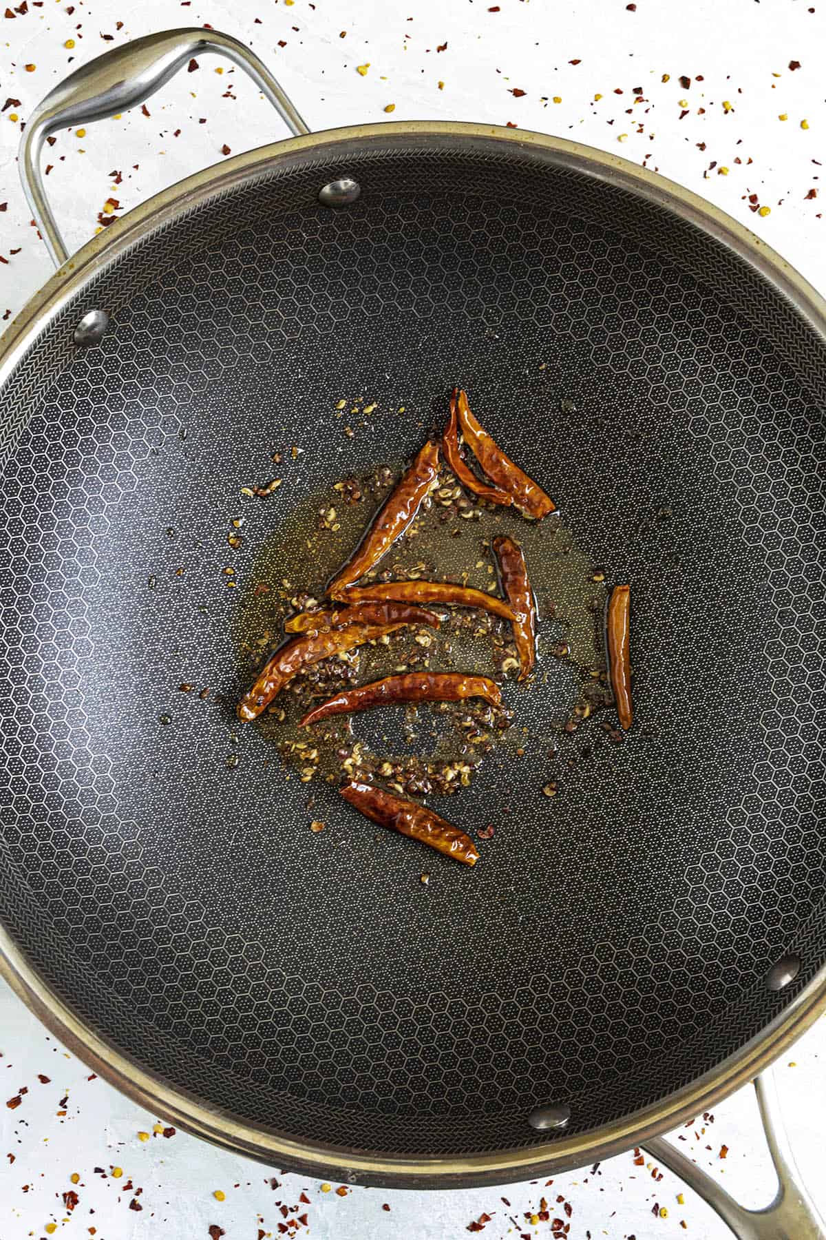 Cooking the chilies to make Kung Pao Sauce