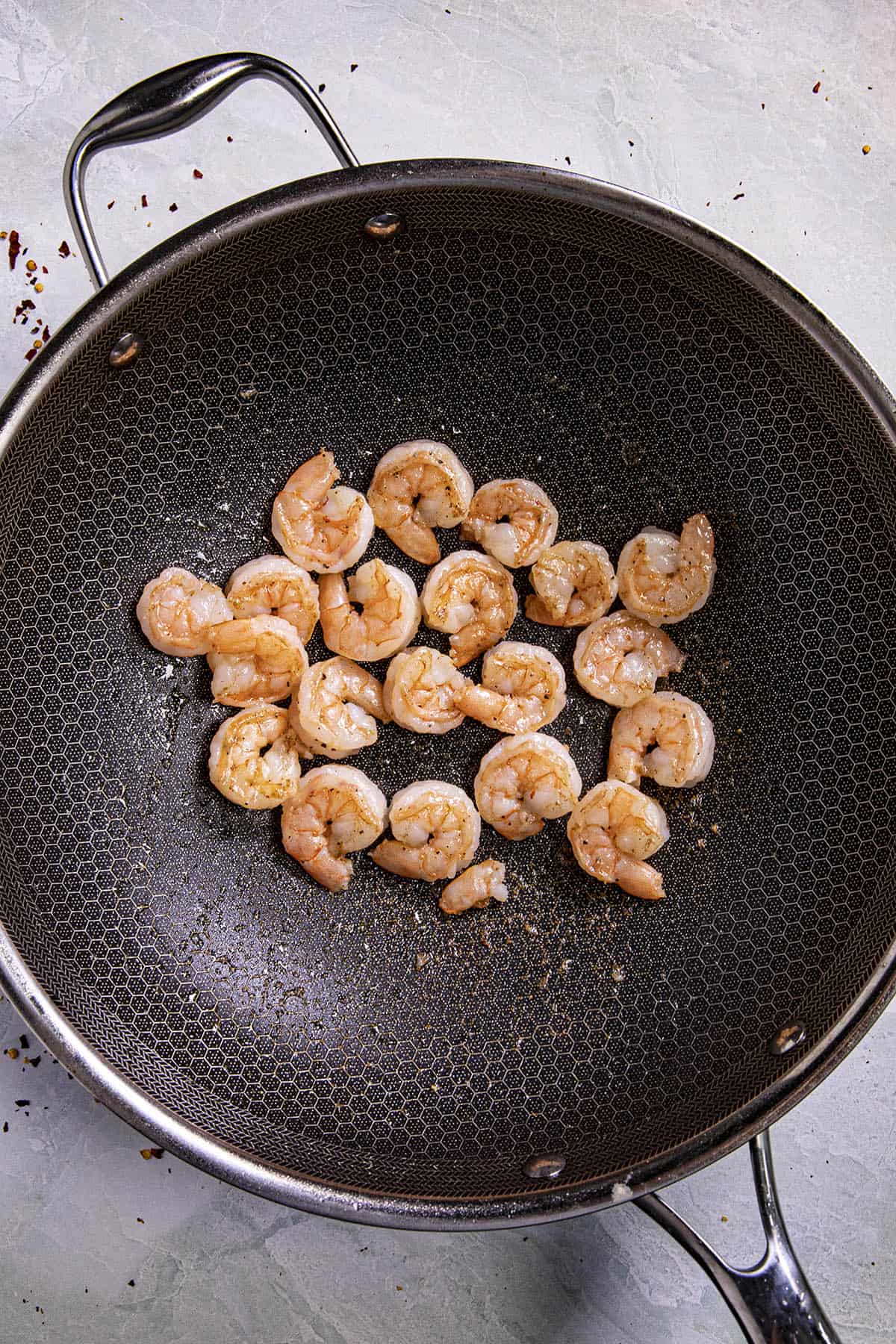 Cooking the shrimp to make Shrimp Fried Rice