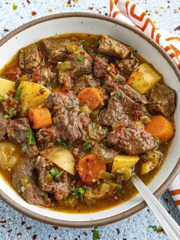 Hungarian Goulash in a bowl with a spoon