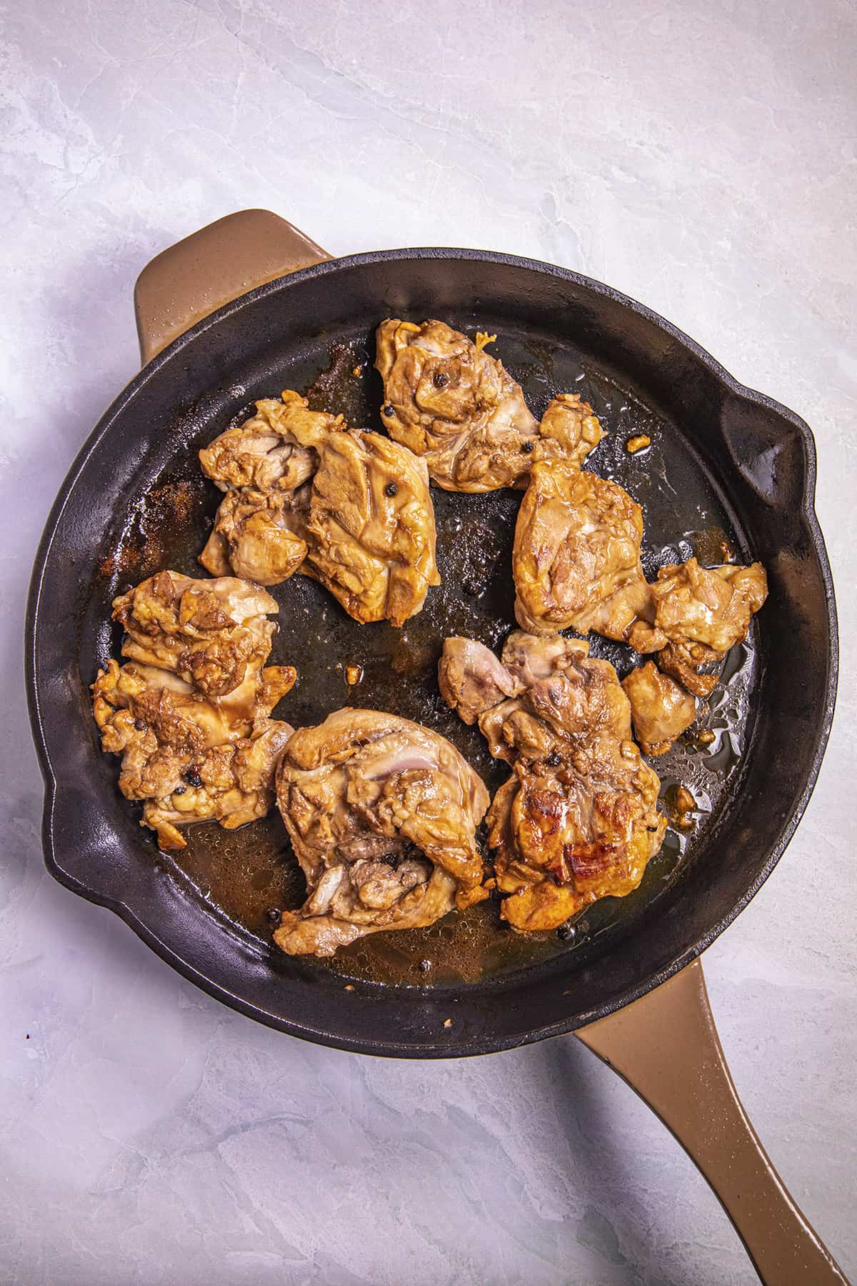 Cooking Chicken Adobo in a hot pan