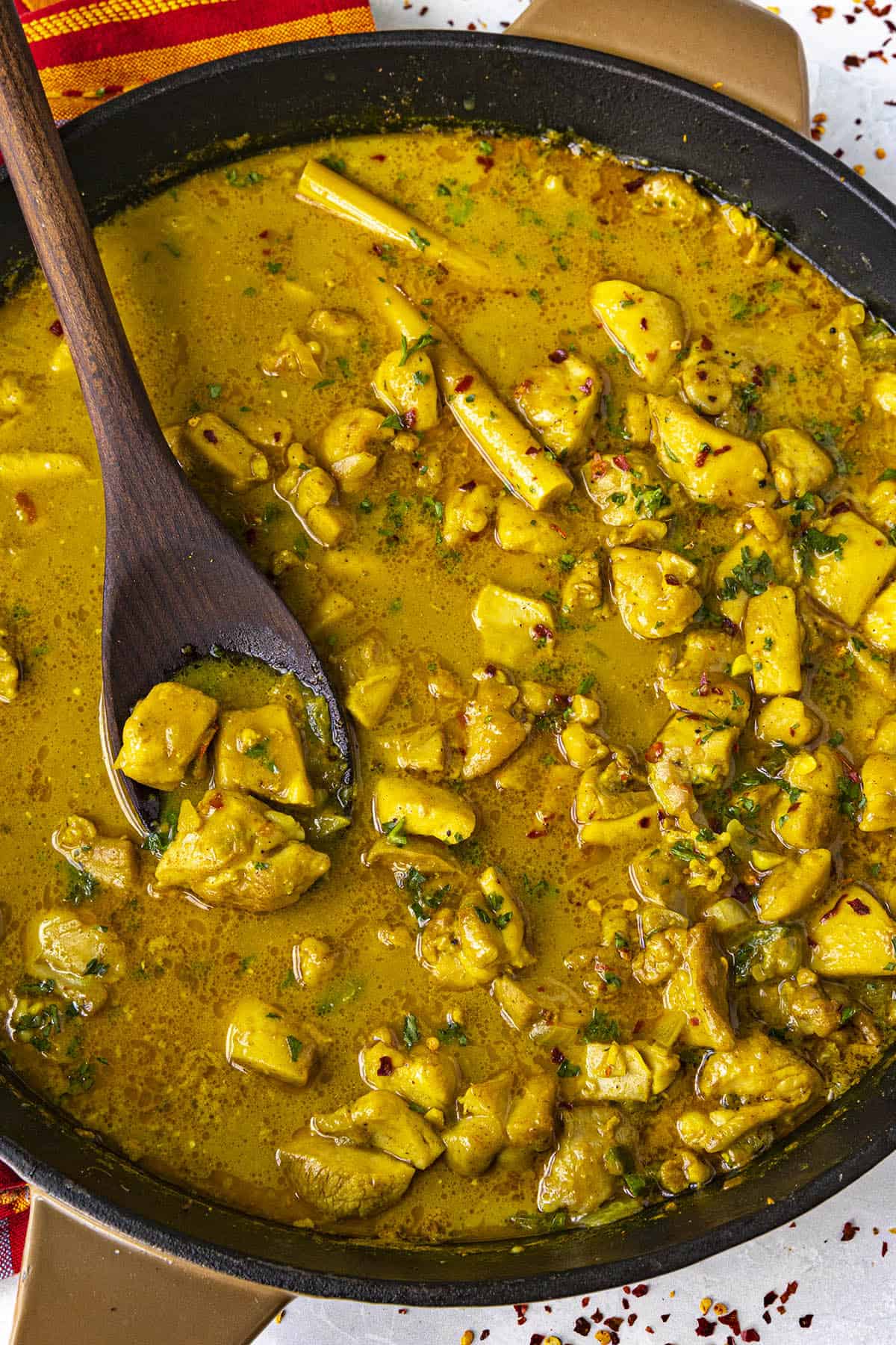 Spicy Coconut Curry Chicken in a pan, ready to serve