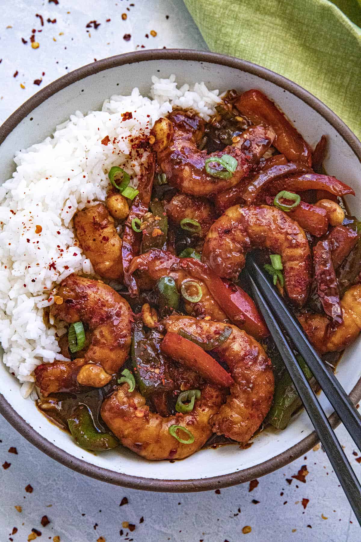 Kung Pao Shrimp in a bowl with chopsticks