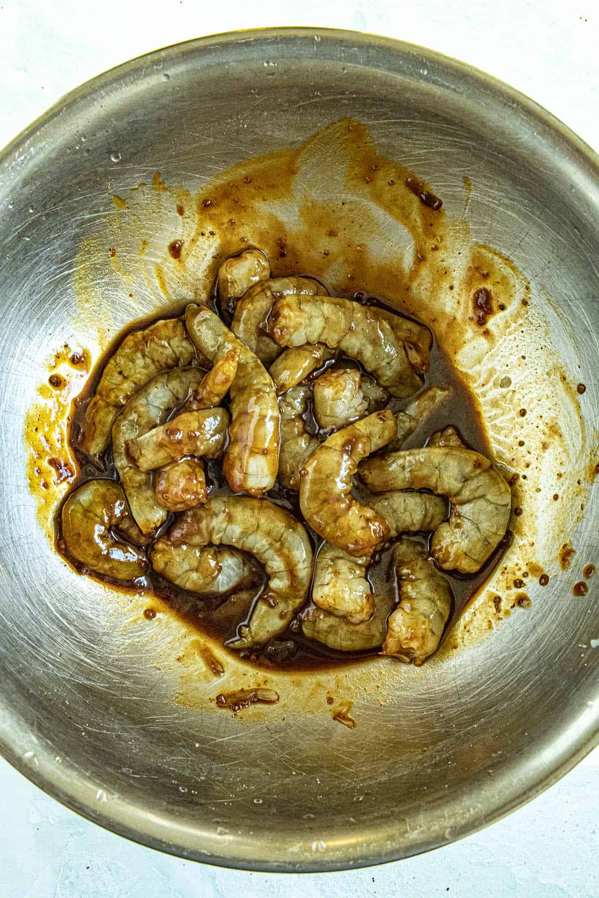 Marinating shrimp to make Kung Pao Shrimp