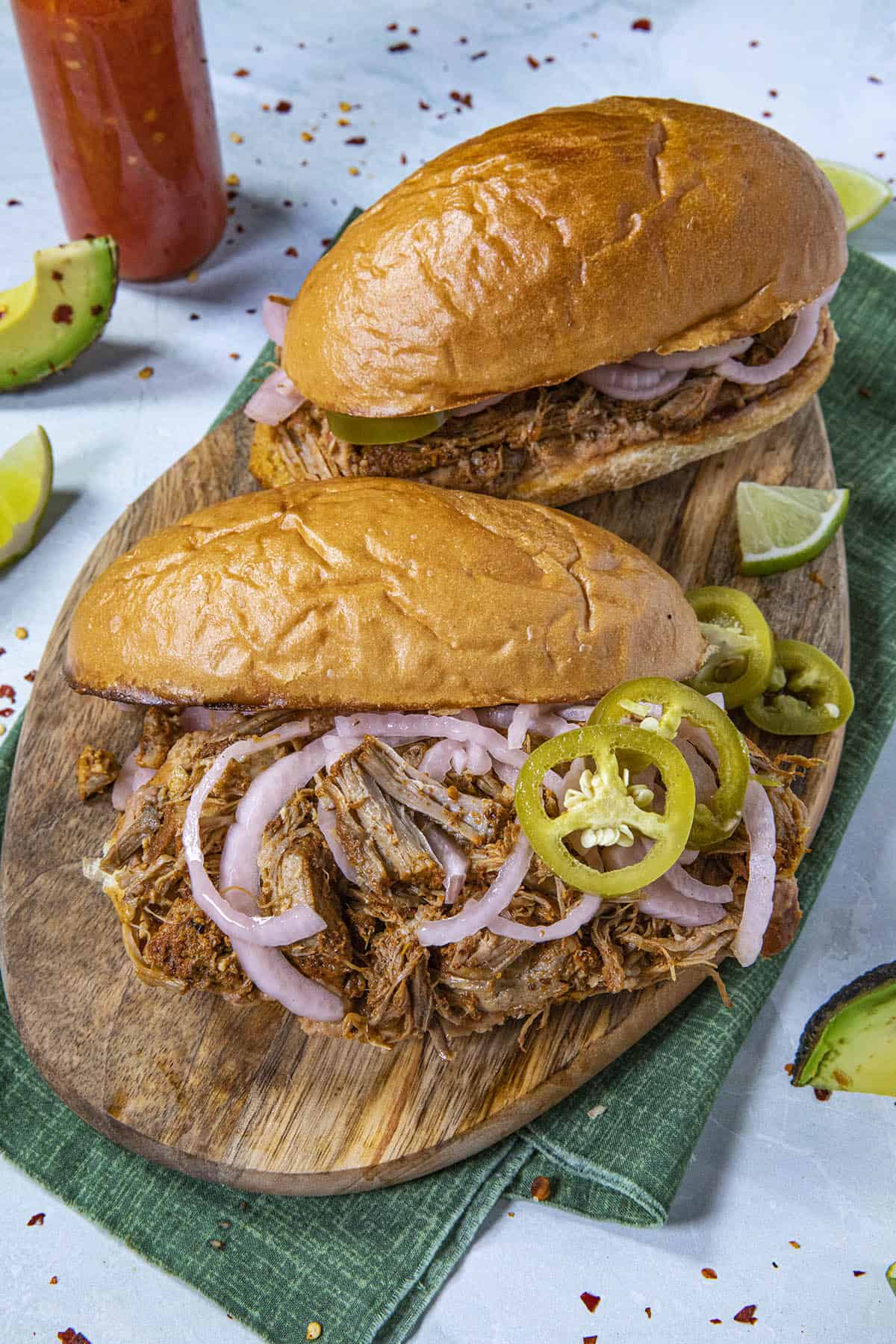 Mexican Torta de Cochinita Pibil with toppings