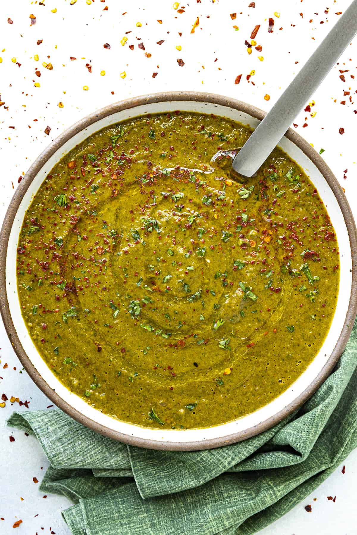 Roasted Poblano Soup in a bowl with garnish