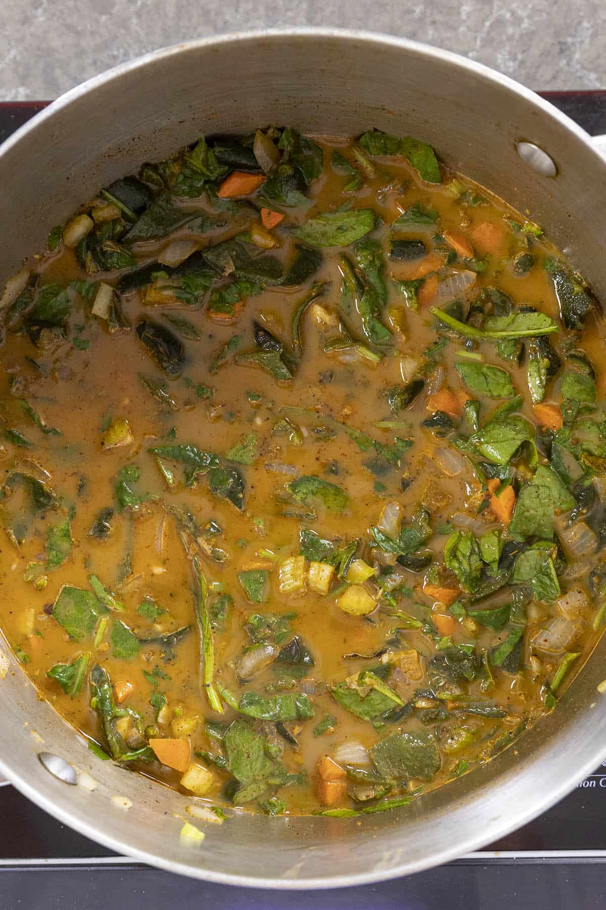 Simmering the Roasted Poblano Soup in a pot