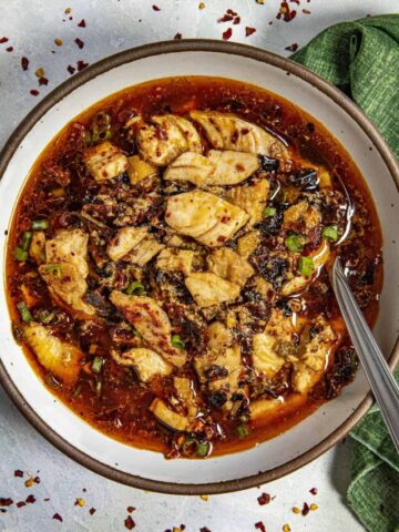 Shuizhu Yu in a bowl with a spoon