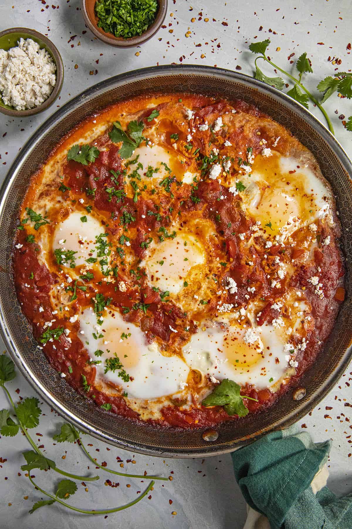 Shakshuka in a pan with garnish