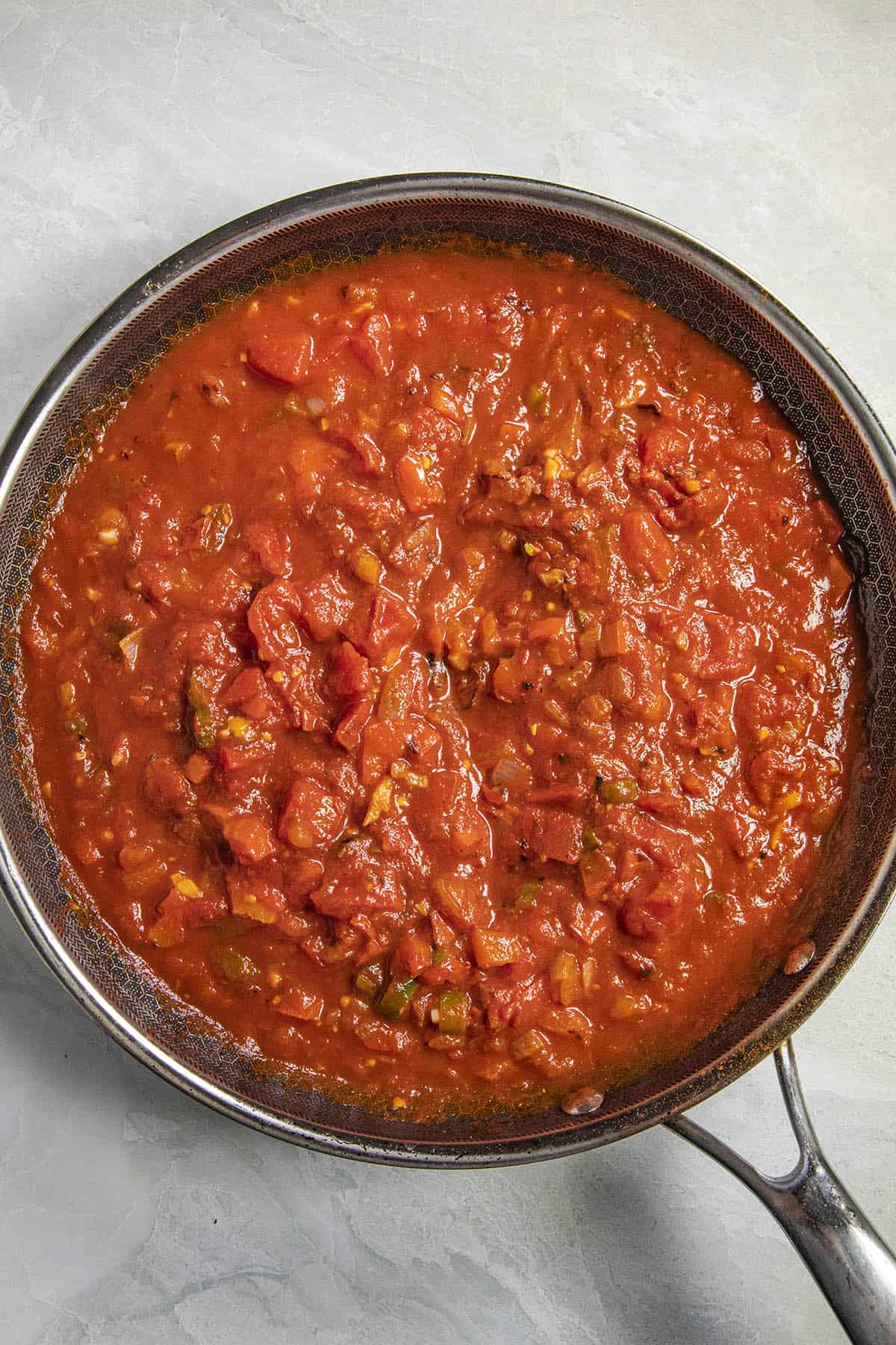 Spicy tomato sauce in a pan to make Shakshuka