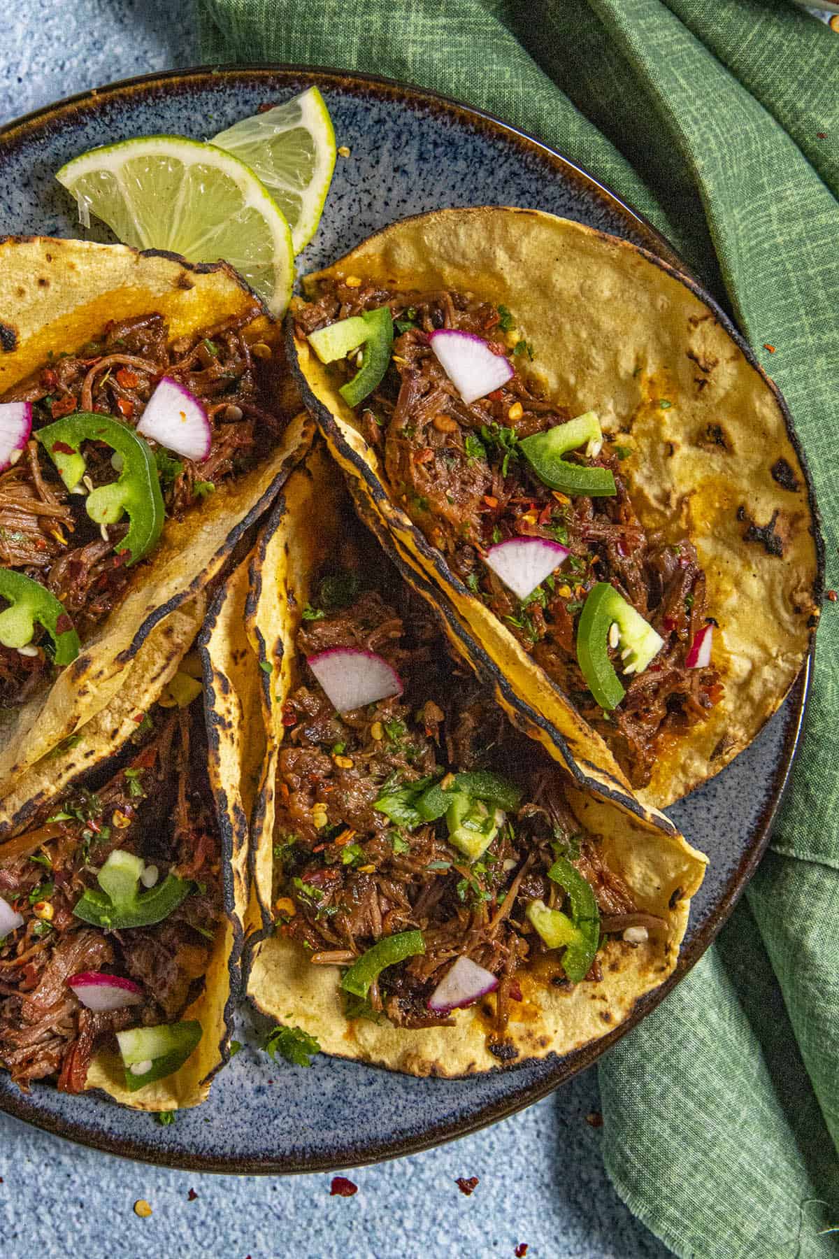 Barbacoa Tacos on toasted corn tortillas