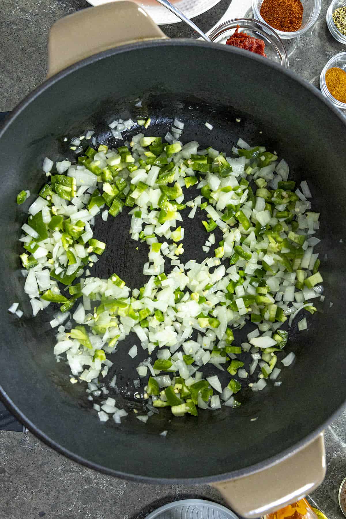 Cooking peppers and onions to make Black Bean Chili