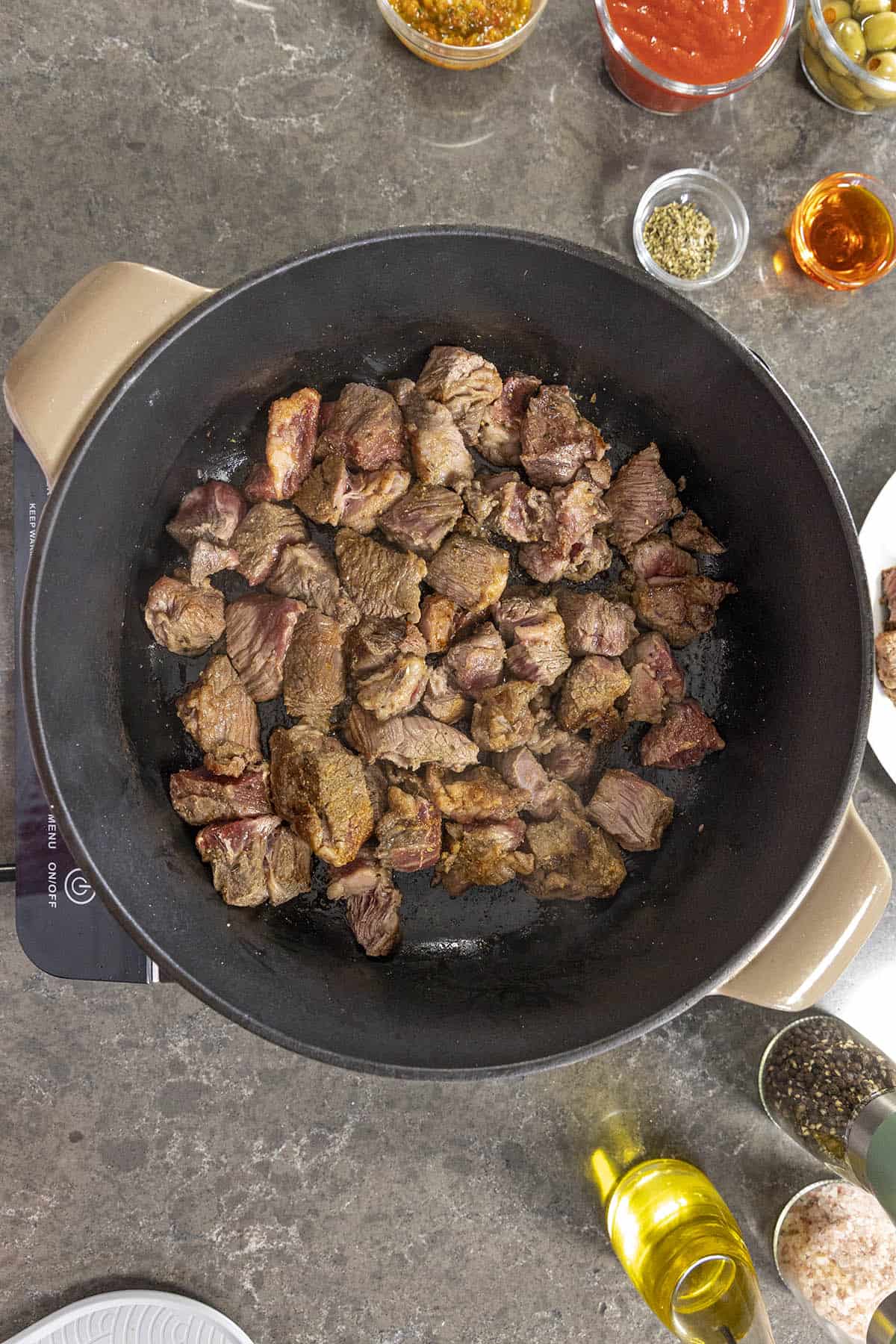 Searing the beef to make Carne Guisada