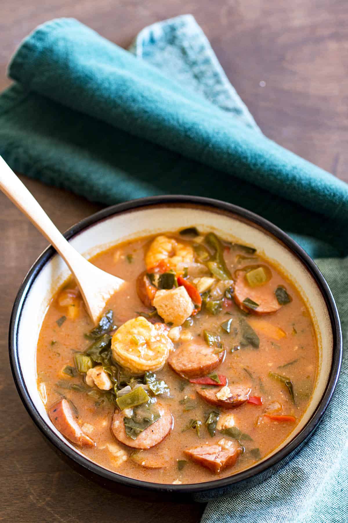 Spicy Gumbo in a bowl with a spoon