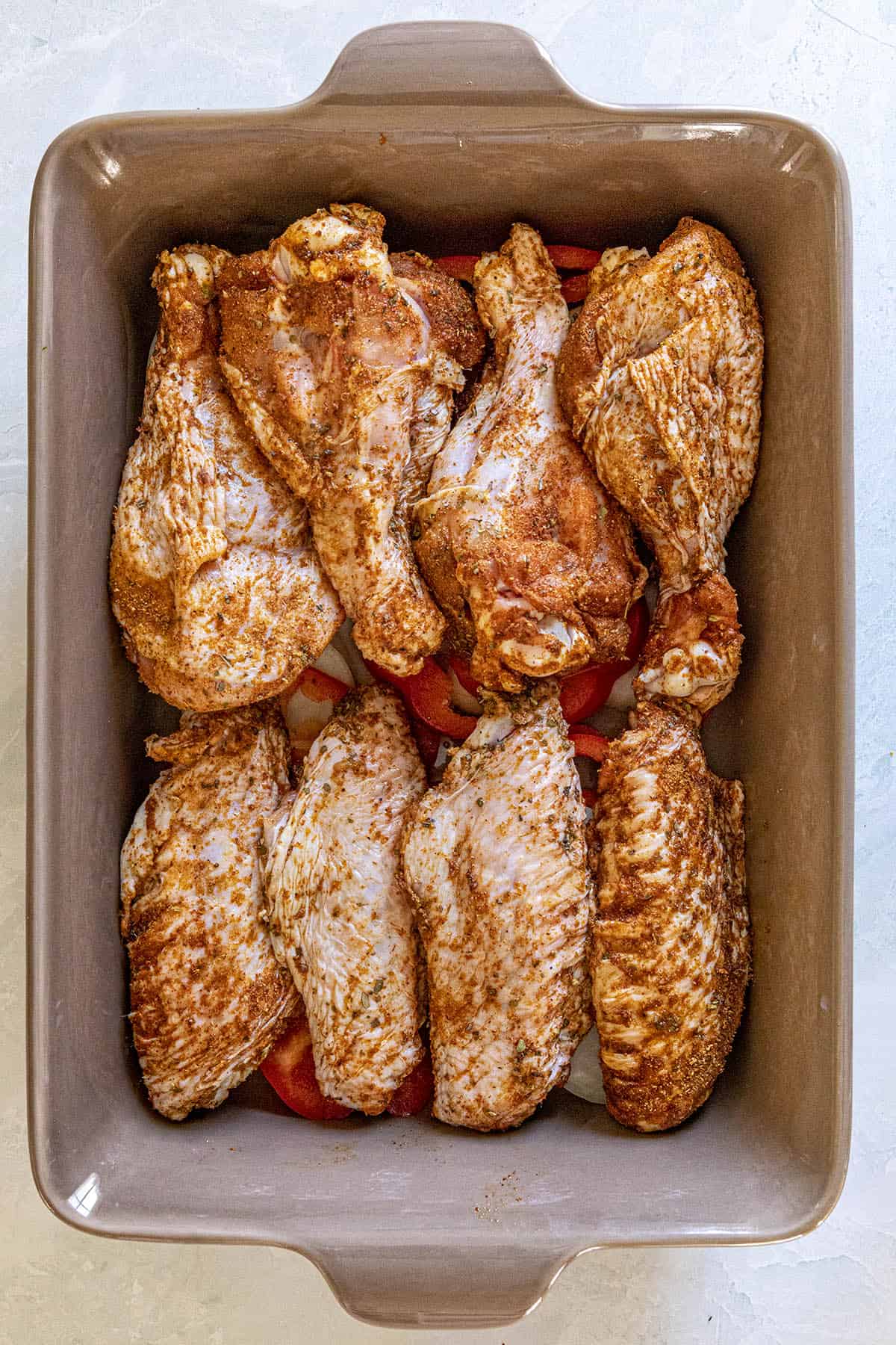 Seasoned turkey wings ready for the oven