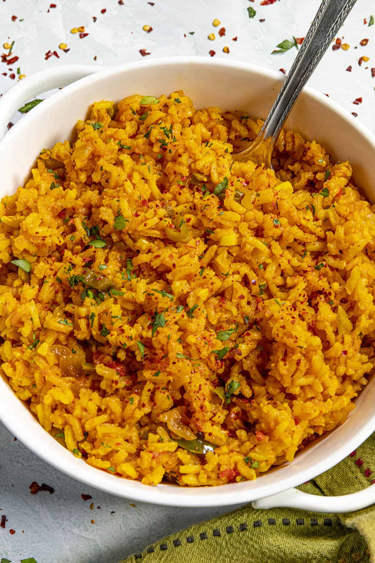 Yellow Rice in a bowl with a fork