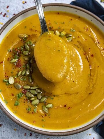 Butternut Squash Soup in a bowl with a spoon