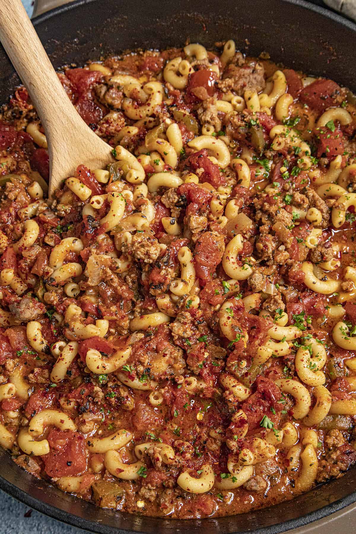 Serving hot Goulash from the pan