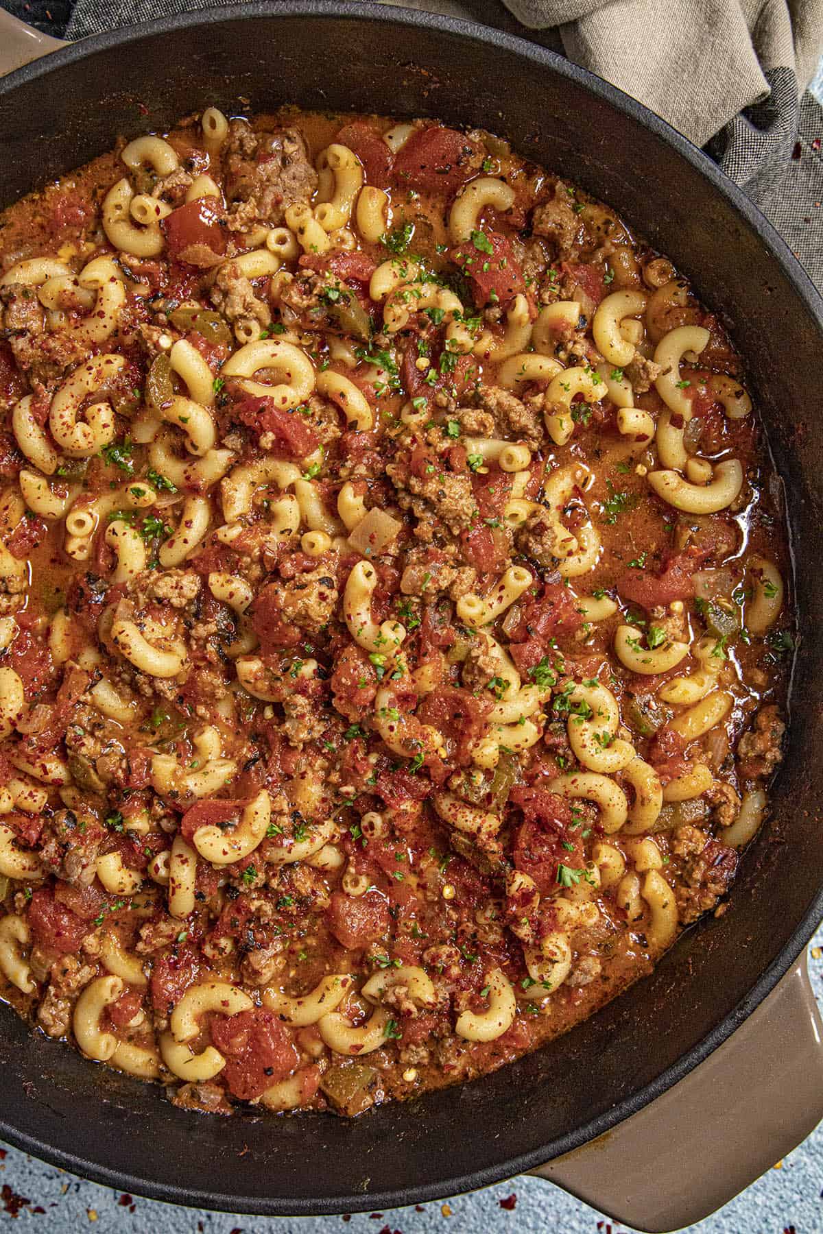 Goulash in a pan with lots of meat and pasta