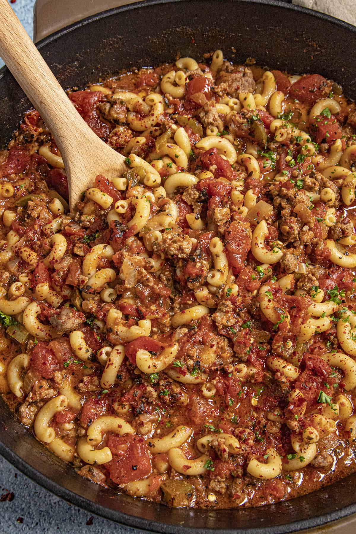 Goulash in a pan with a spoon