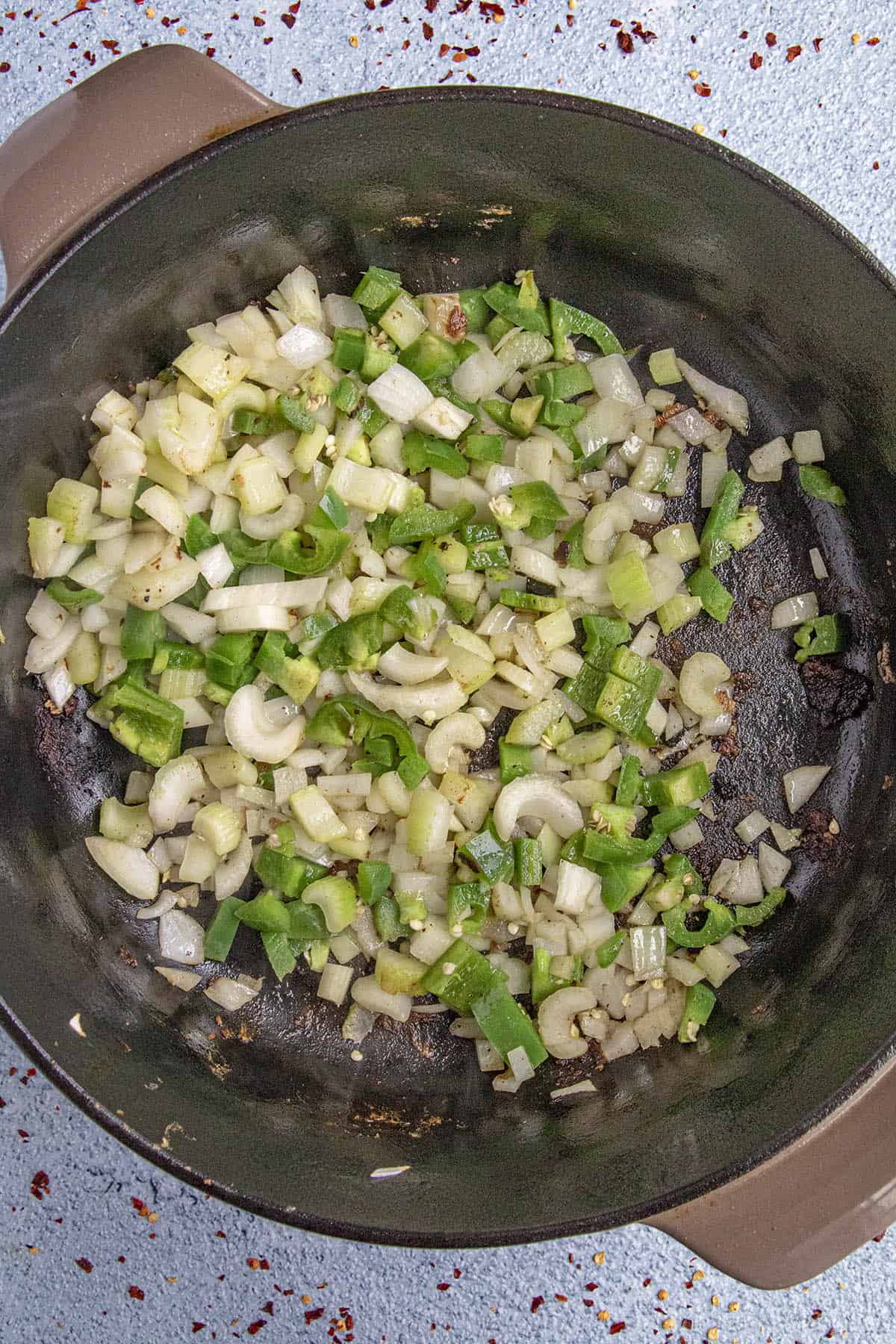 Cooking onions, celery and peppers to make Beef Stew