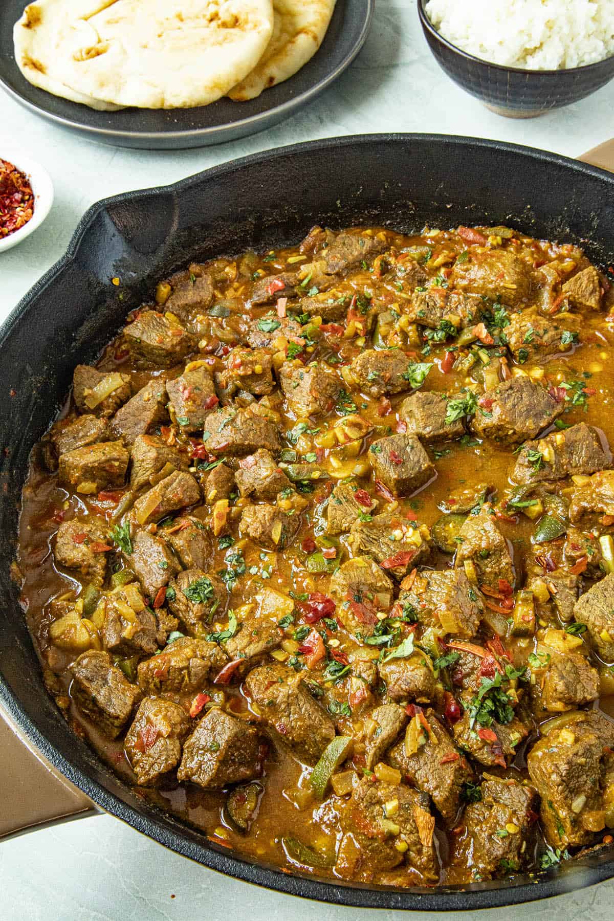 Spicy Beef Vindaloo in a pan, ready to serve